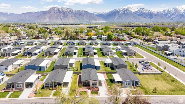 Aerial view of residential area with a mountain backdrop | Image 17