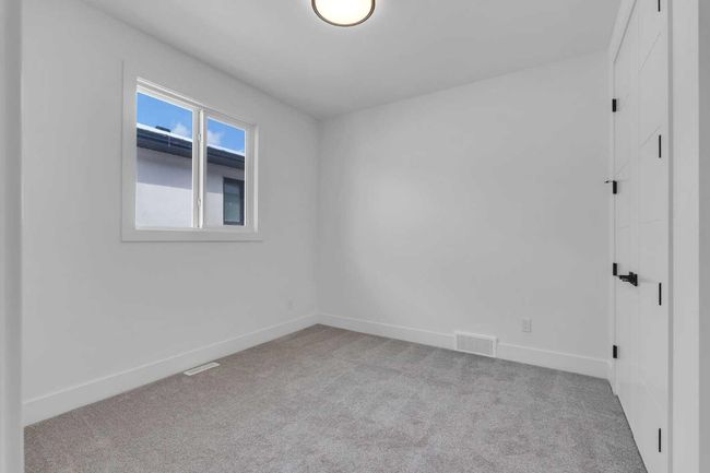 223 Kinniburgh Loop, House other with 4 bedrooms, 4 bathrooms and 5 parking in Chestermere AB | Image 36
