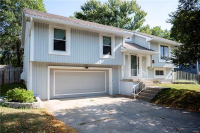 Bi-level home featuring a garage | Image 2