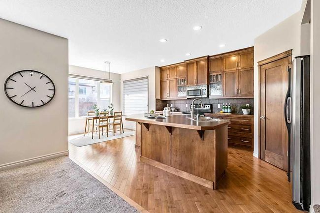 419 Cimarron Blvd, House other with 3 bedrooms, 3 bathrooms and 4 parking in Okotoks AB | Image 4
