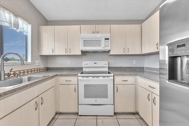 0 - 9780 W Daffodil Ln, Home with 3 bedrooms, 2 bathrooms and null parking in Miramar FL | Image 16
