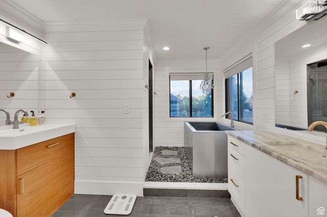 Full bathroom with two vanities, ornamental molding, a stall shower, and recessed lighting | Image 18