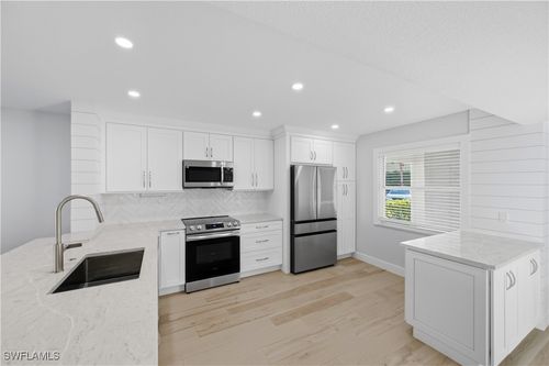 e101-1330 Derbyshire Ct, NAPLES, FL, 34116-3635 | Card Image