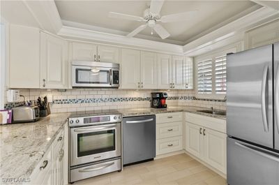 Renovated kitchen, granite countertop, stainless steel appliances | Image 2