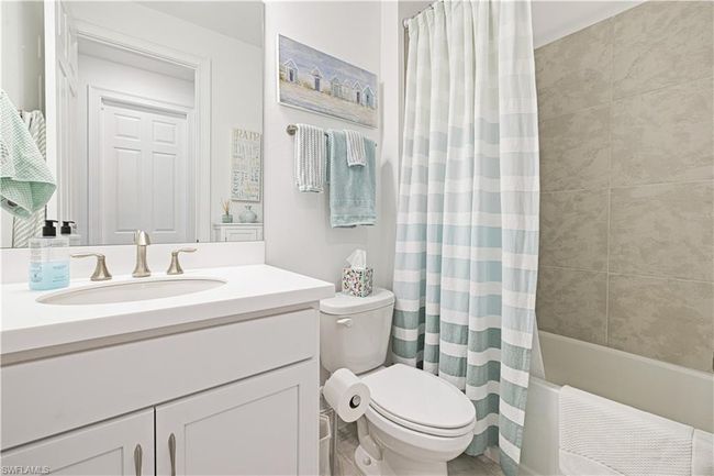 Full bathroom with vanity and shower / tub combo | Image 21