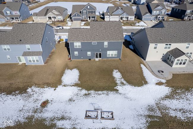 snowy aerial view featuring a residential view | Image 50