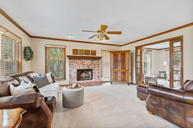 Brick gas log fireplace. View from Kitchen | Image 13