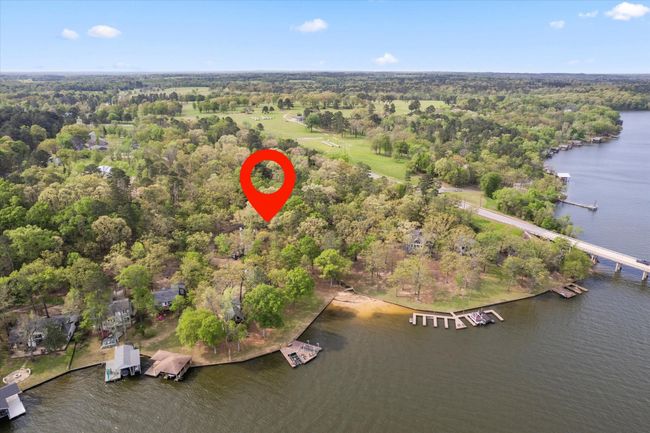 Aerial view featuring a wooded view and a water view | Image 11