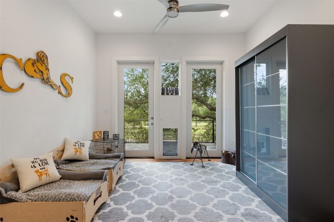 A custom-designed flex space with direct outdoor access for your four-legged family members. | Image 22