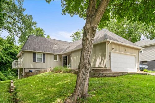 1406 Ne 52nd Ter, Kansas City, MO, 64118-5707 | Card Image