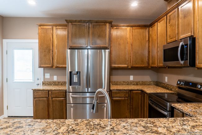 Plenty of cabinet space in kitchen | Image 15
