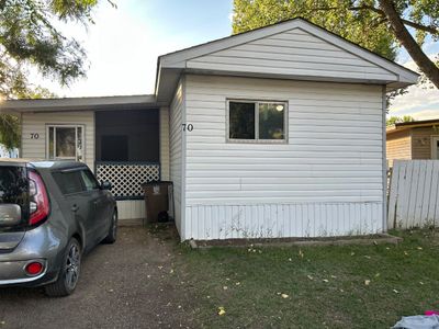 70 Greenbrook Villge E, Home with 3 bedrooms, 1 bathrooms and 2 parking in Brooks AB | Image 1