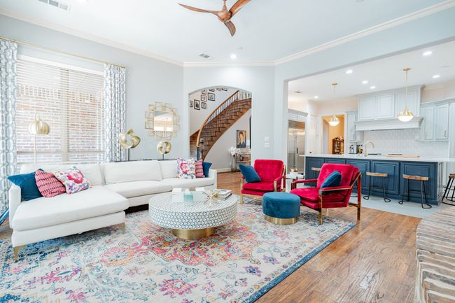 Living room featuring stairs, ceiling fan, light wood-style flooring, ornamental molding, and recessed lighting | Image 16