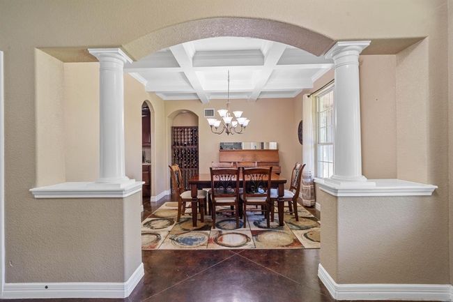 Formal dining room. Wine rack stays. | Image 5