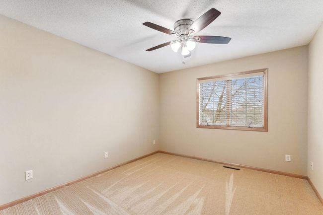 Bedroom 3 with ceiling fan. | Image 18