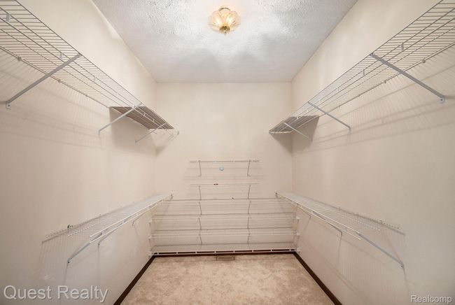 Primary Suite Walk-In Closet | Image 18