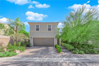 Beautiful private home with mature landscaping and paved oversized driveway. | Image 1