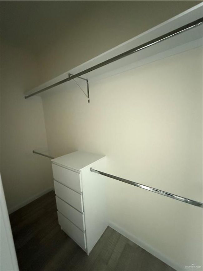View of spacious closet | Image 9