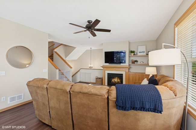 Custom built-ins and shelving to the right of the fireplace | Image 17