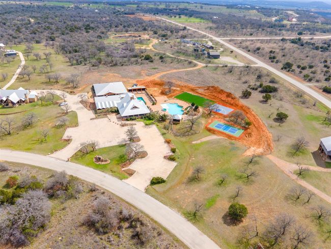 Aerial view of property's location featuring a pool area | Image 8