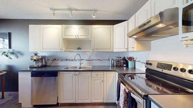 2 - 6408 Bowwood Drive Nw, Home with 2 bedrooms, 1 bathrooms and 1 parking in Calgary AB | Image 11
