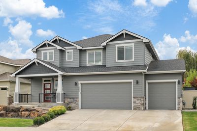 1009 W Osprey Heights Dr, Home with 4 bedrooms, 3 bathrooms and null parking in Spokane WA | Image 2