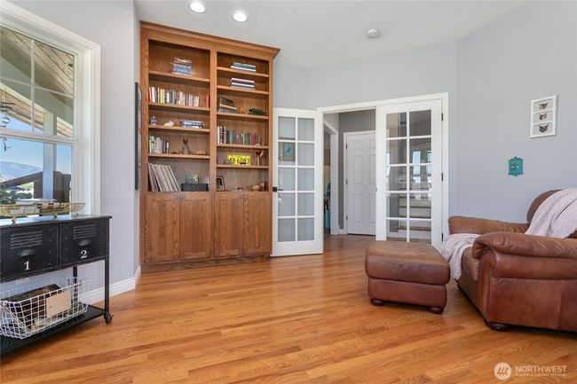 Custom built in shelving in the expansive office. | Image 8