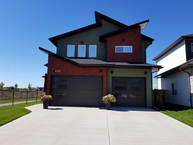 6522 Grande Banks Drive, Home with 5 bedrooms, 3 bathrooms and 6 parking in Grande Prairie AB | Image 2