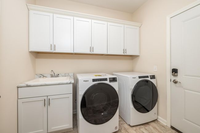 Main floor laundry room! | Image 24