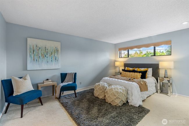 Primary bedroom is oversized to accommodate a sitting area or larger sized furniture. Also has double closets! | Image 21