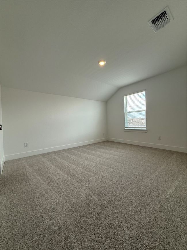 Additional living space with vaulted ceiling, baseboards, carpet floors, and recessed lighting | Image 33