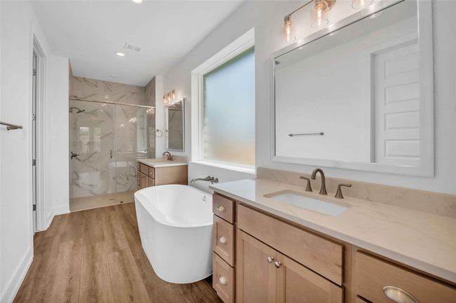 Please Note: These interior photos are not of the actual design, but are of a completed design with a similar floor plan. Finishes, features, and layouts may vary. | Image 11