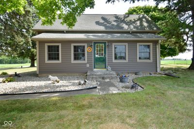 This beautiful farmhouse, completely renovated in 2002, offers a serene retreat far enough from the hustle and bustle yet conveniently located with easy access to I-74. | Image 1