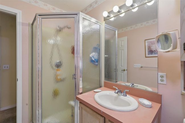Primary bath also has stand-up shower | Image 16