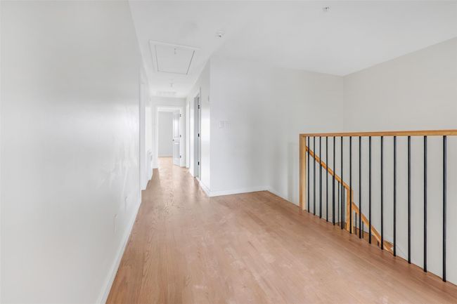 Hallway featuring light hardwood / wood-style flooring | Image 43