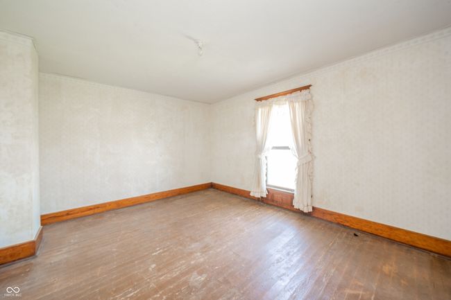 unfurnished room with hardwood / wood-style floors and baseboards | Image 15