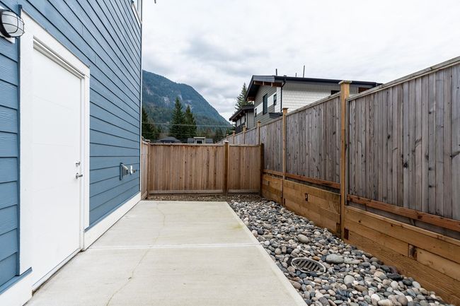 View of patio featuring a mountain view and fence | Image 14