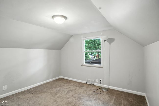 additional living space with carpet and lofted ceiling | Image 35