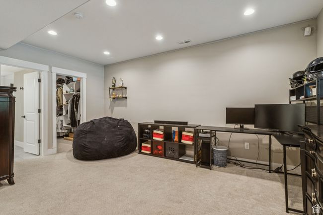 Misc room featuring carpet, recessed lighting, and an office area | Image 60