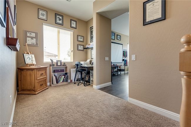Carpeted home office featuring baseboards | Image 32