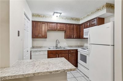 Open kitchen with appliances | Image 3