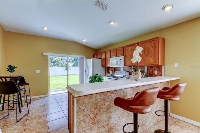 Kitchen with eat in space | Image 13