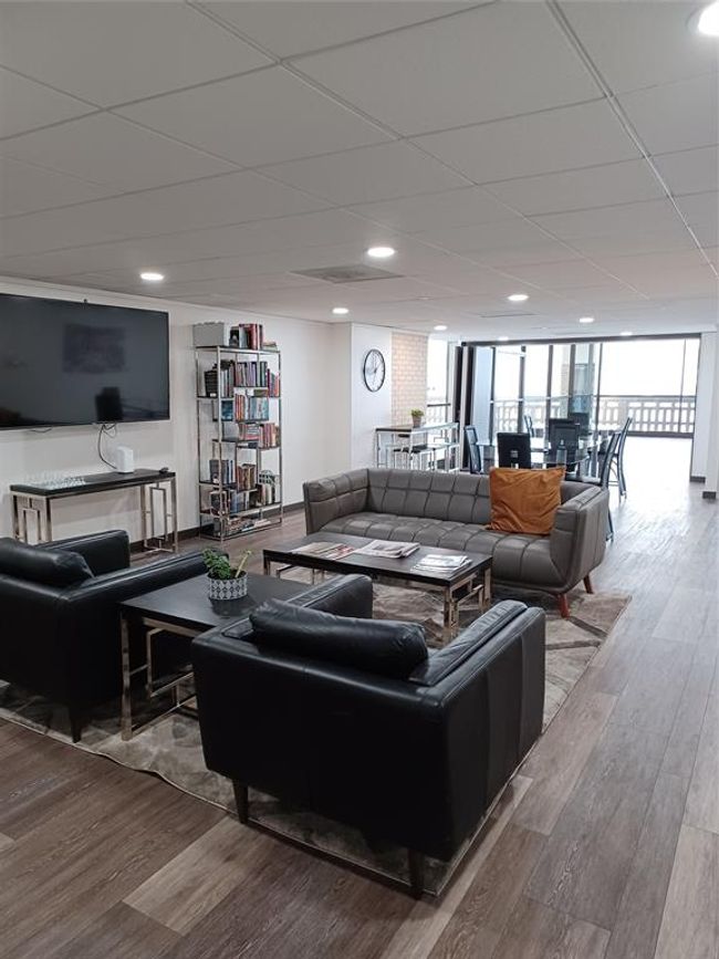 The library/lounge on the 6th floor. This view looks toward the Skyline Room. | Image 23