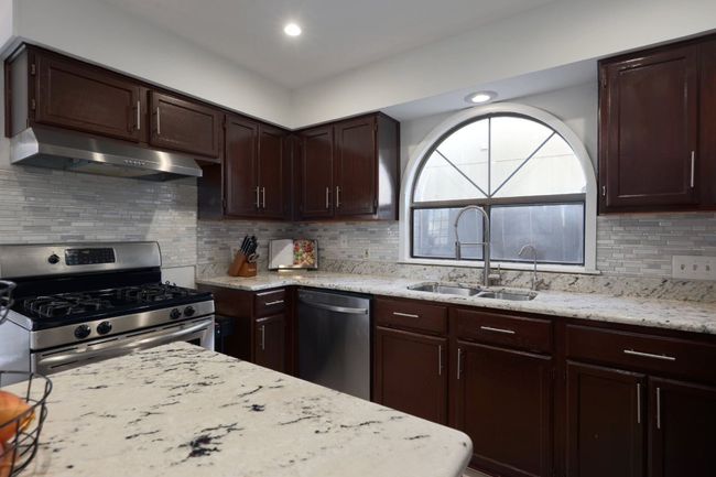 If you’re someone who enjoys the weekend ritual of cooking and hosting, this kitchen has everything you need—a great layout, lots of space to prep, and plenty of room for everyone to gather around | Image 10