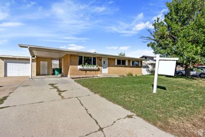 2048 W Celia Way, House other with 4 bedrooms, 2 bathrooms and 2 parking in Layton UT | Image 2