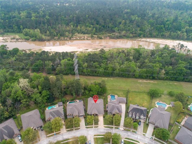 You are about 400 meters from a great swimming beach along Spring Creek. Your house sits free from flooding with great access to nature and family fun. | Image 41
