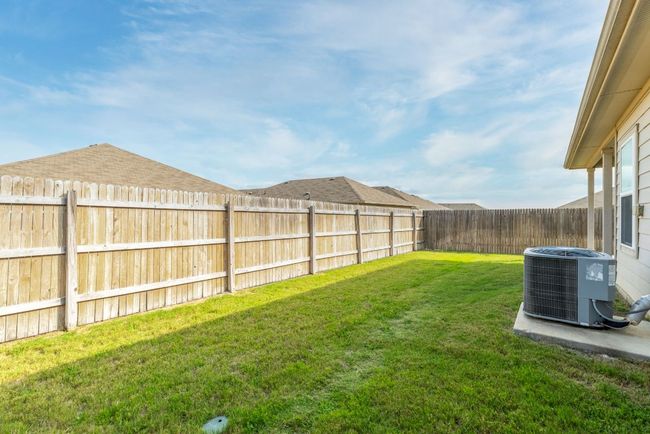 View of yard featuring central AC | Image 39