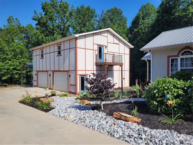 garage right side - apartment deck | Image 33
