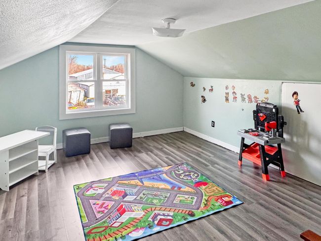 Head upstairs to two more bedrooms! | Image 18