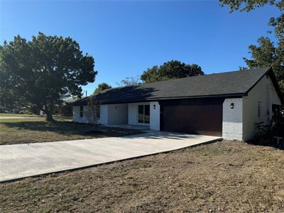 Single story home featuring a garage | Image 3